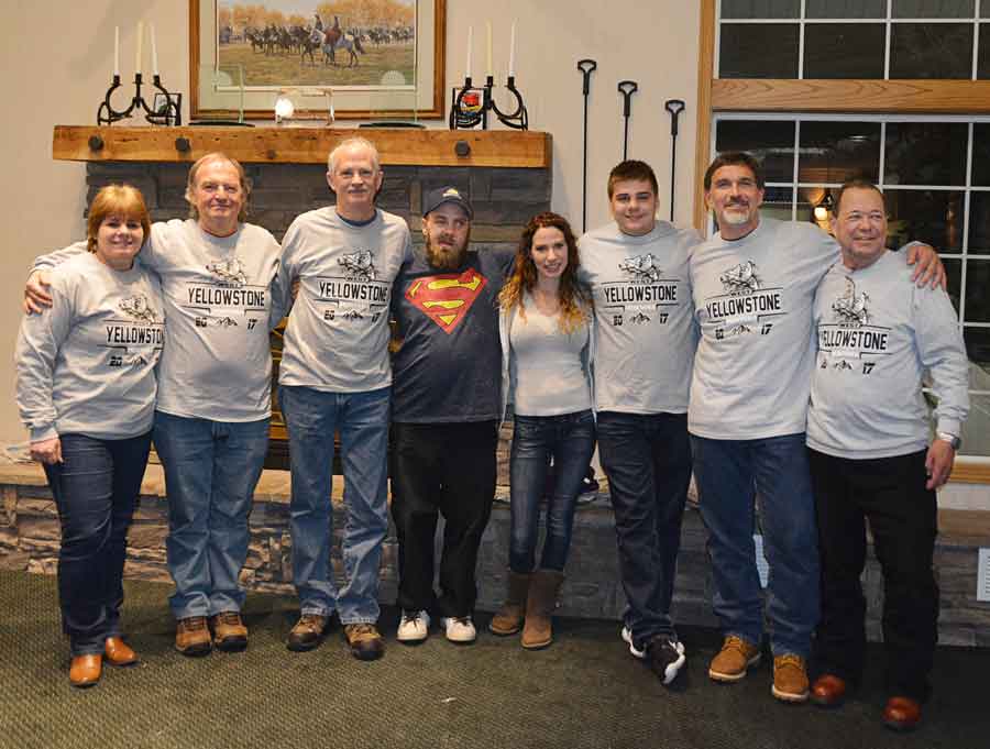 NH snowmobile club poses at West Yellowstone