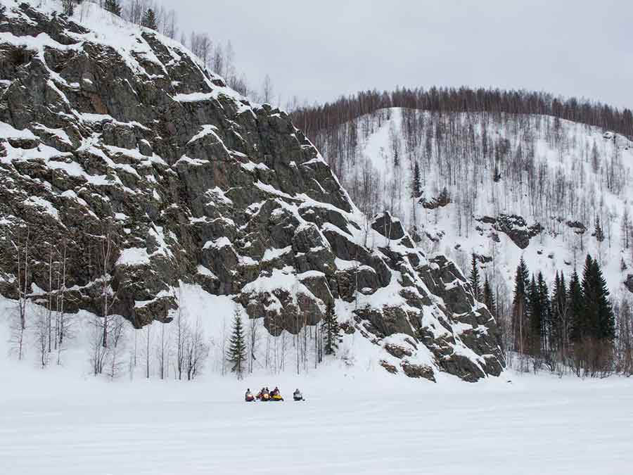 Snowmobiles on Kosva River Ural Mountains