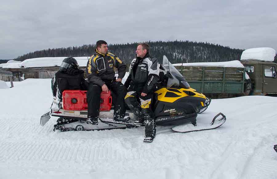 Roman Shtefan and Dan Gould snowmobile adventure in abandoned village of Bolshaya, Russia