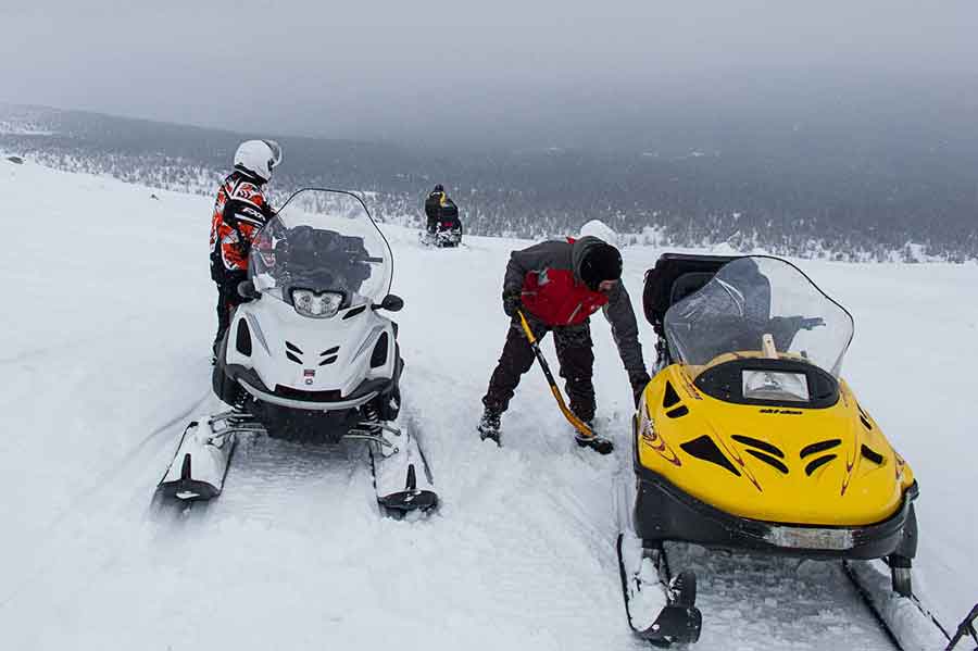 Sergey Valeev and Vlad Klekney snowmobile in Russia