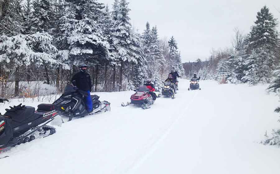 NH snowmobile riders