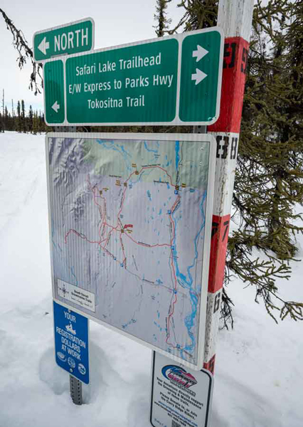 Snowmobile sign Petersville Alaska of Safari Lake, Tokositna Trail.